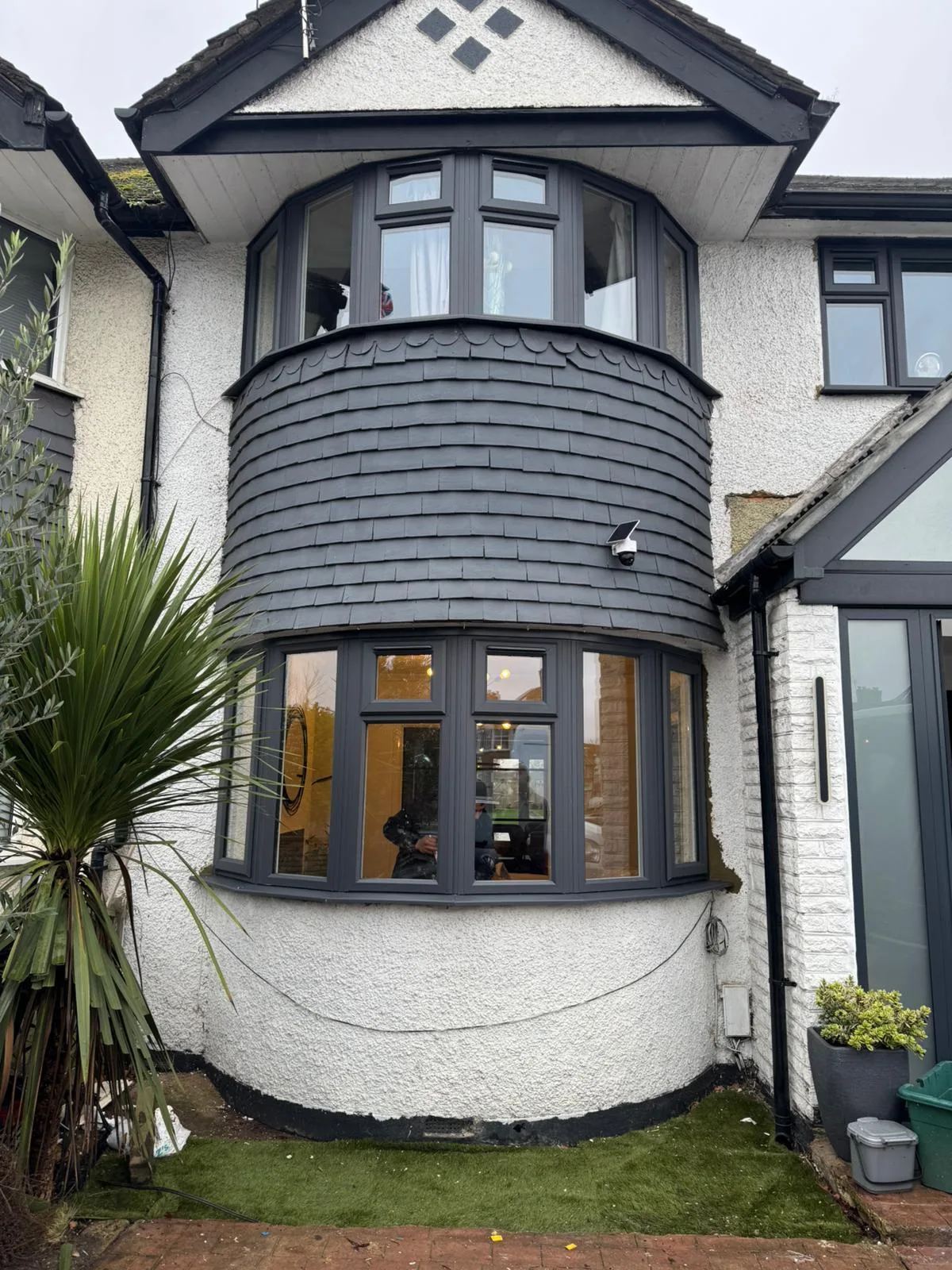 Bow window on a rendered turret