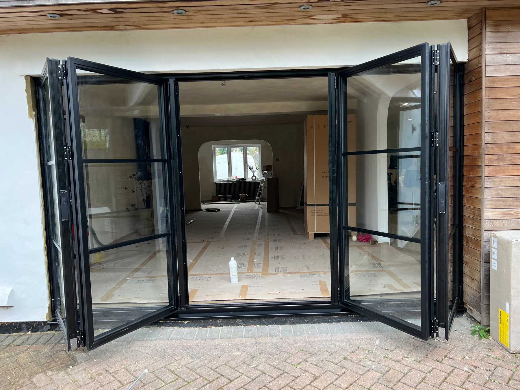 Bi-folding doors stacked fully open