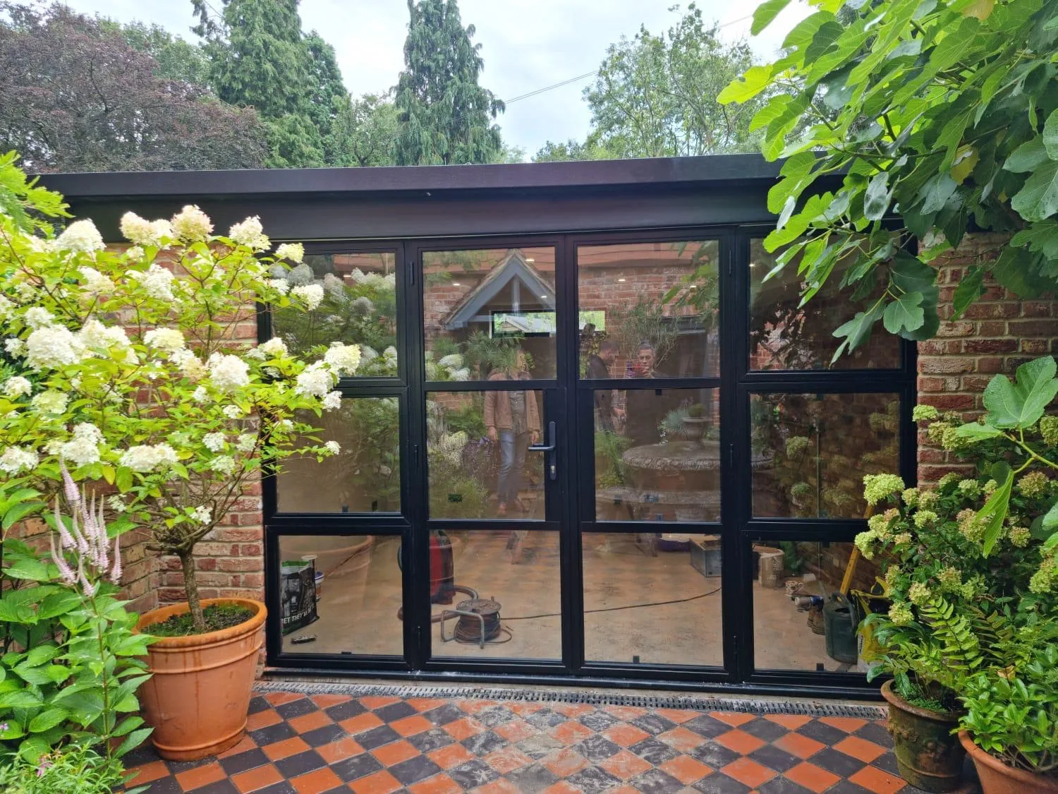 Crittall garden room, encaustic tiled terrace