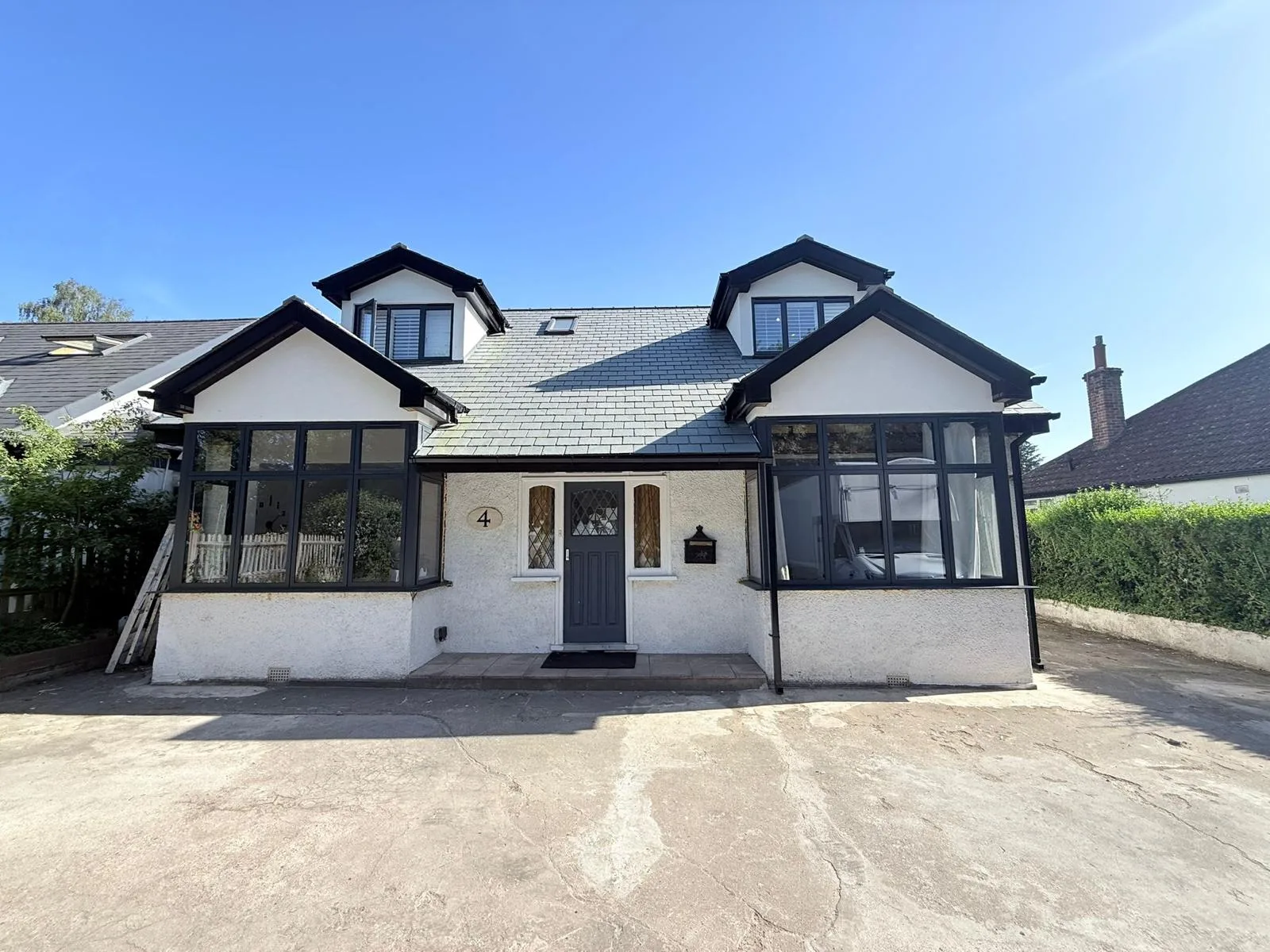 Anthracite flush casements and matching front door
