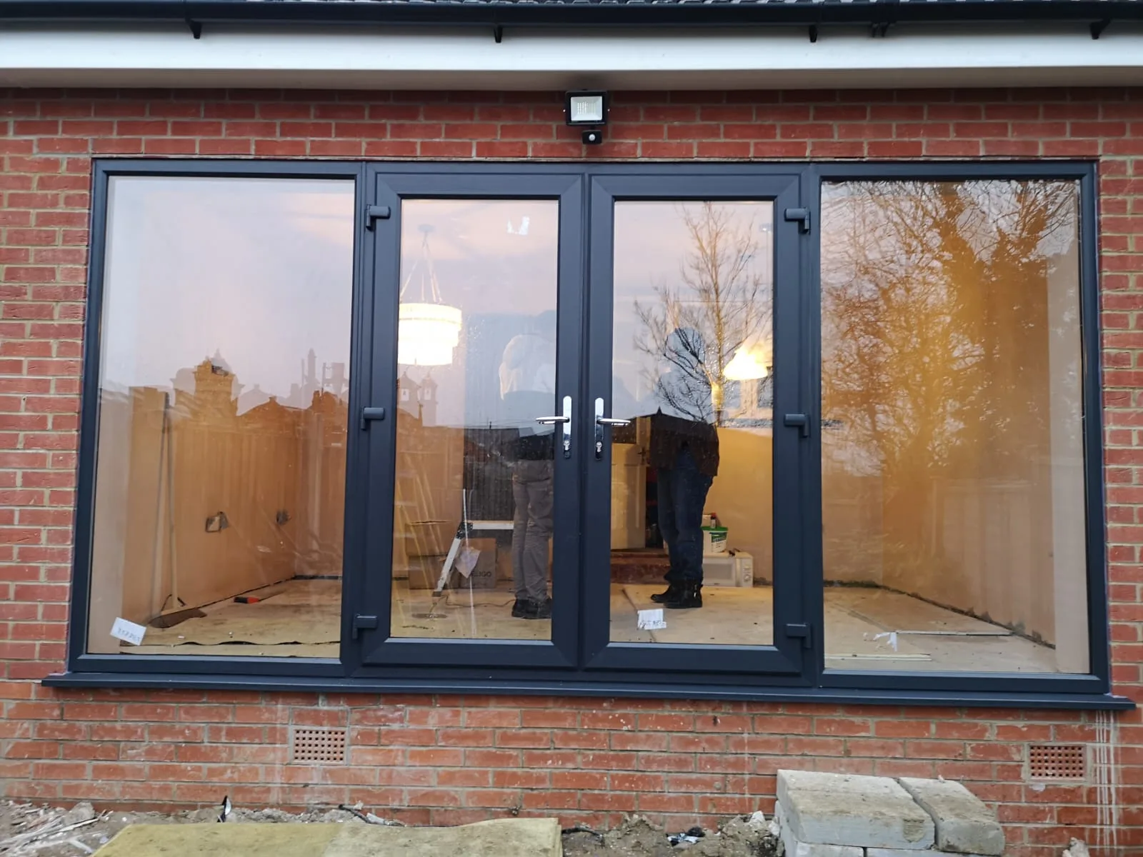 Anthracite French doors, brick garden elevation