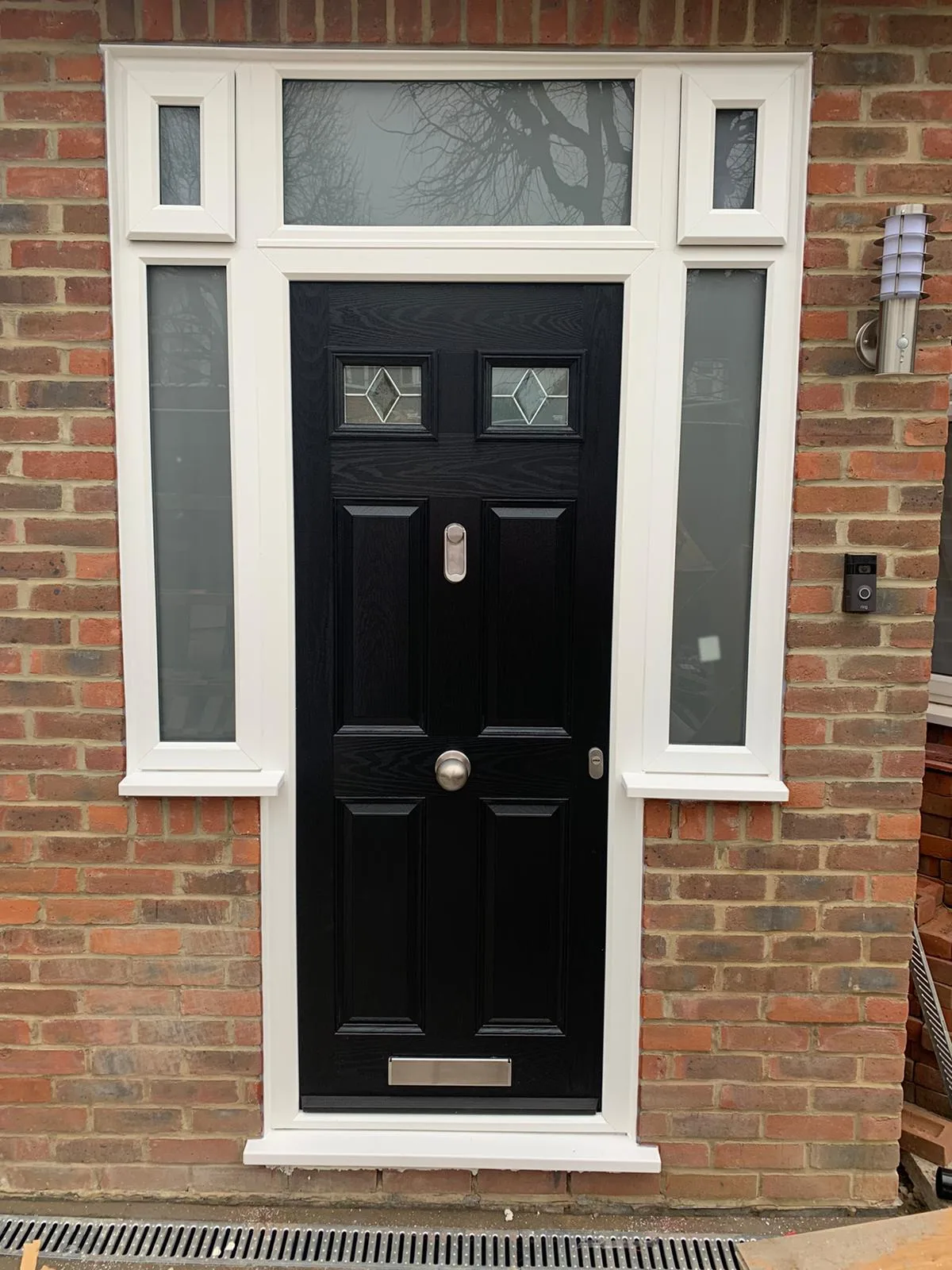 Black composite door with sidelights
