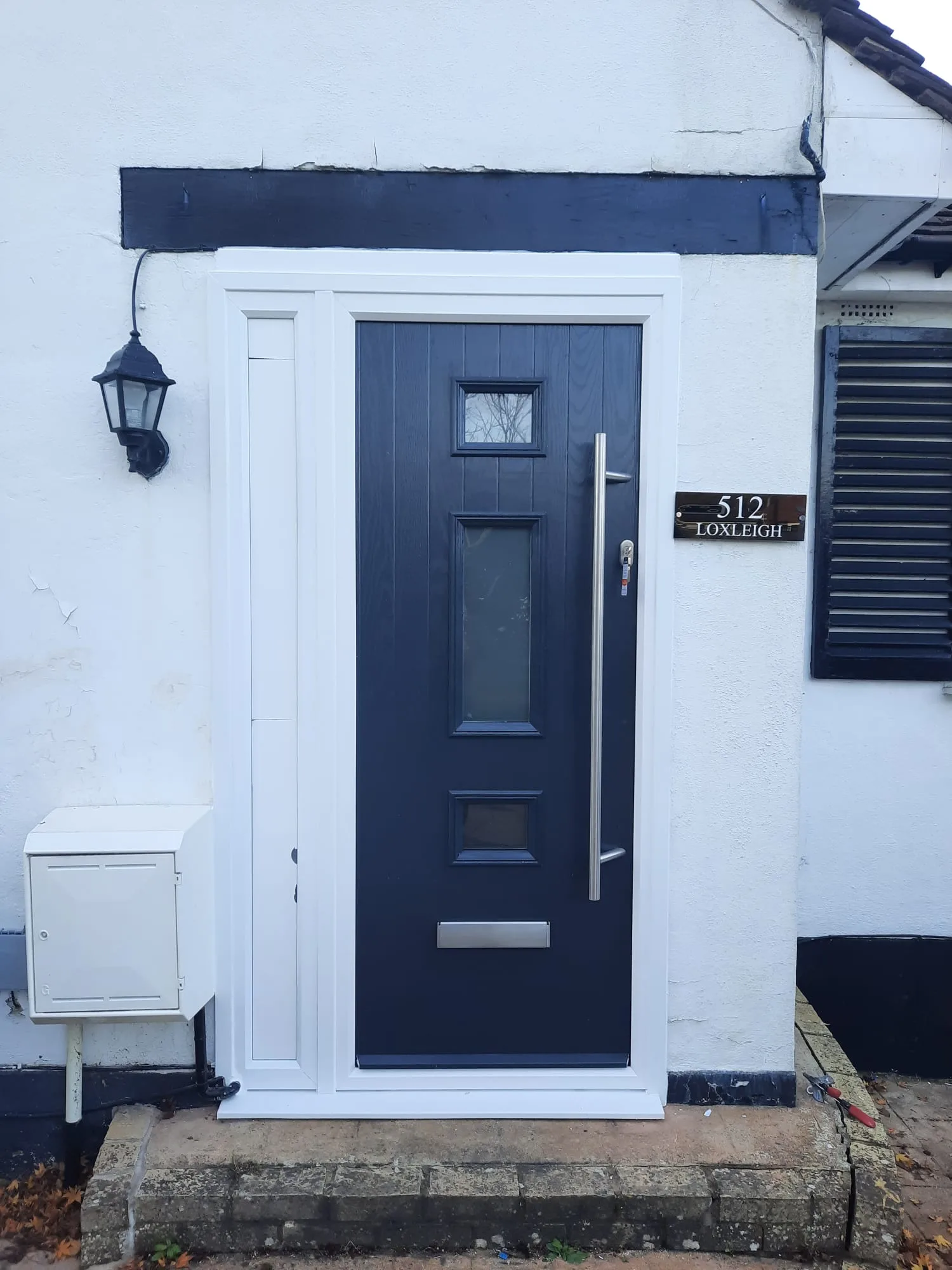 Navy composite door with lantern