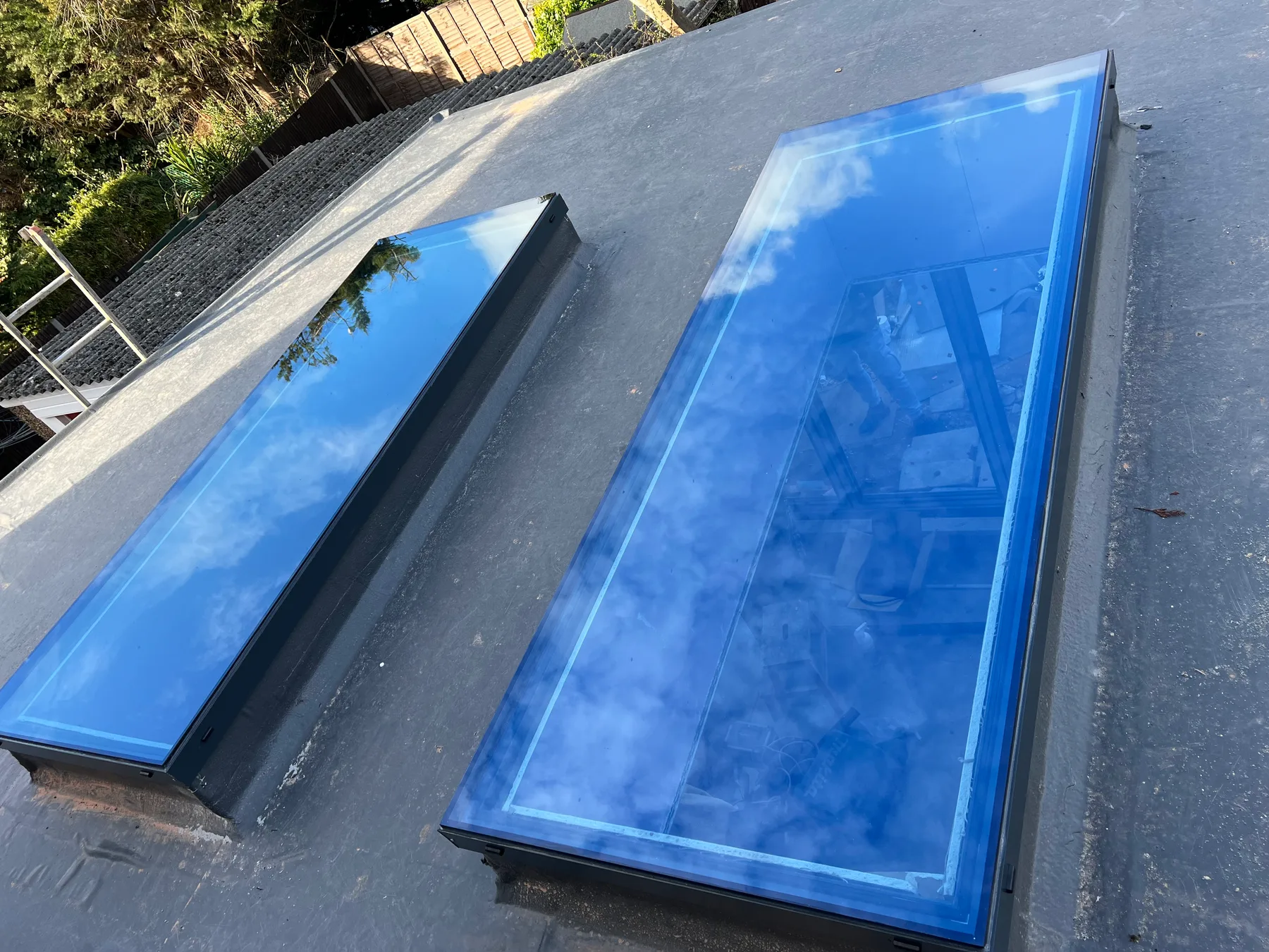 Twin slim rooflights · flat roof